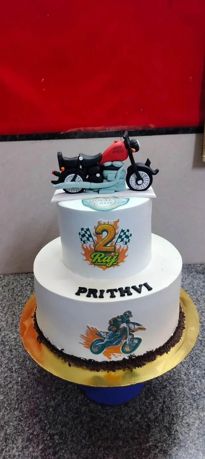 Celebration cake with a motorcycle decoration