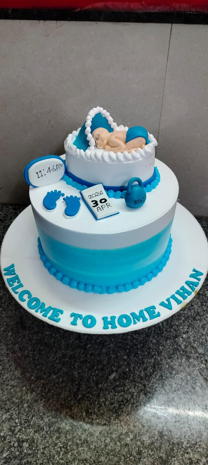 Tiered celebration cake with character decorations